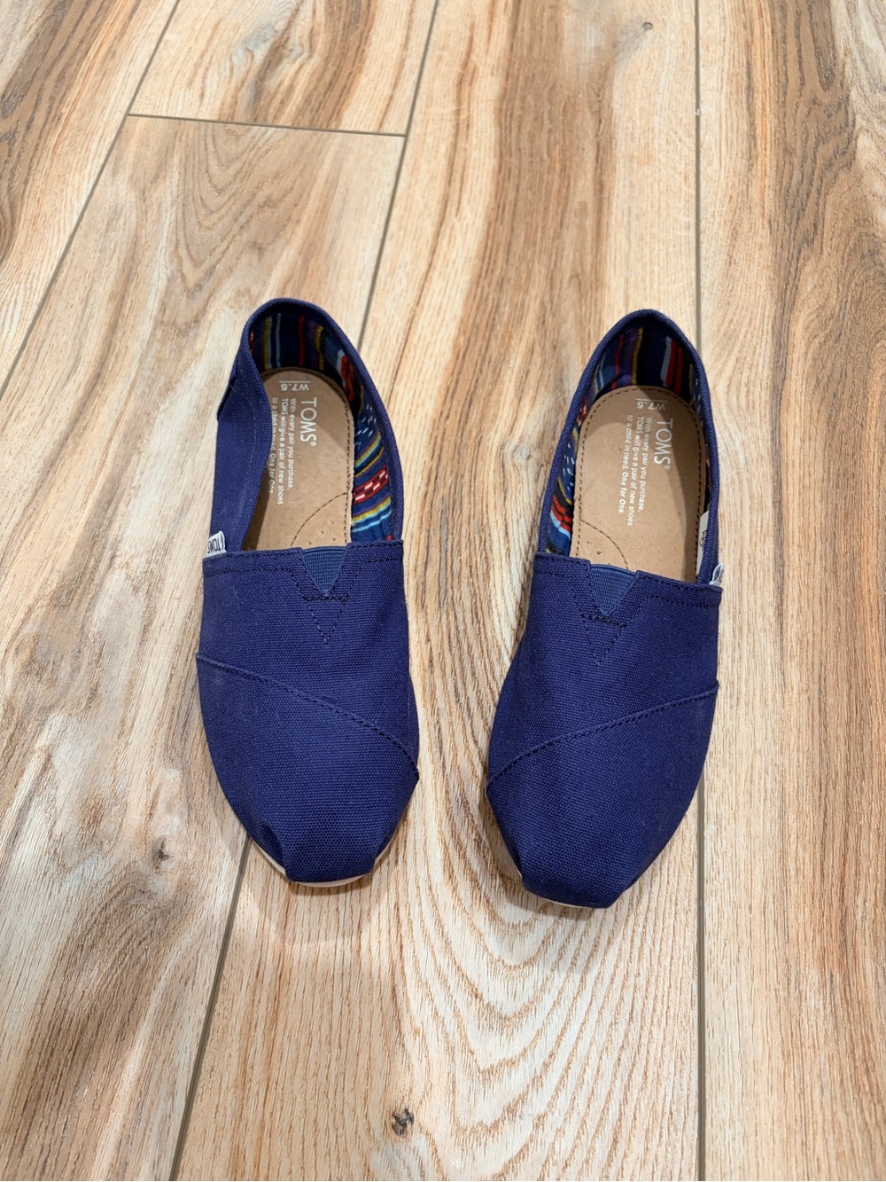 Toms Women’s Navy Canvas Slip-On Loafers
